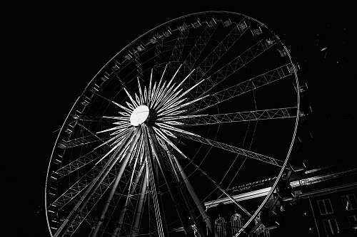 ferris wheel gray and black Ferris wheel during nighttime amusement park